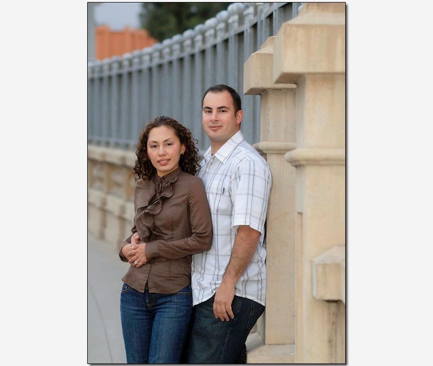 HIspanic-American couple on historic bridge