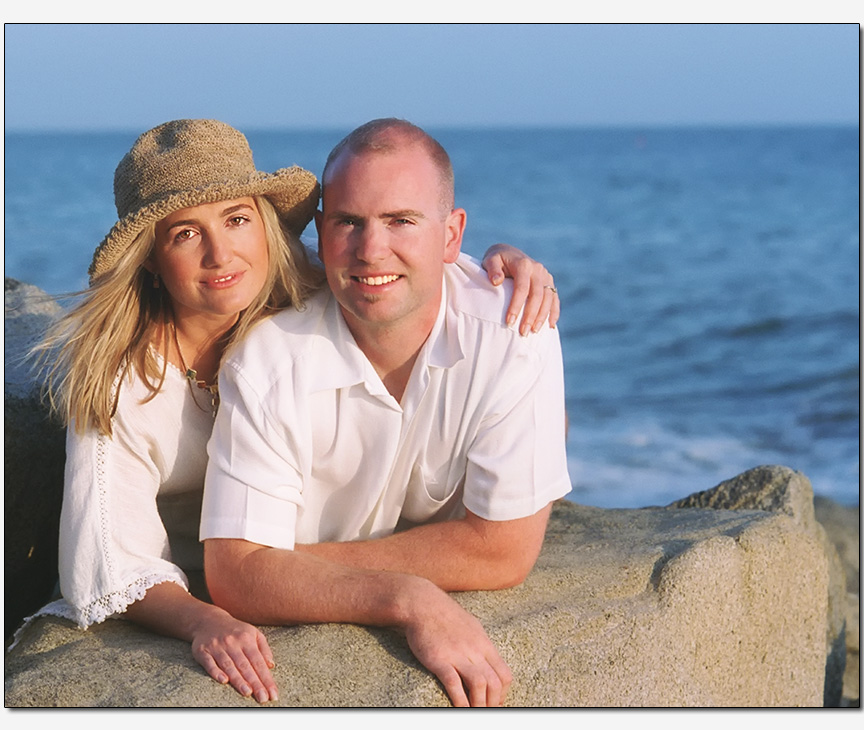 engagement session feature couple on a beach